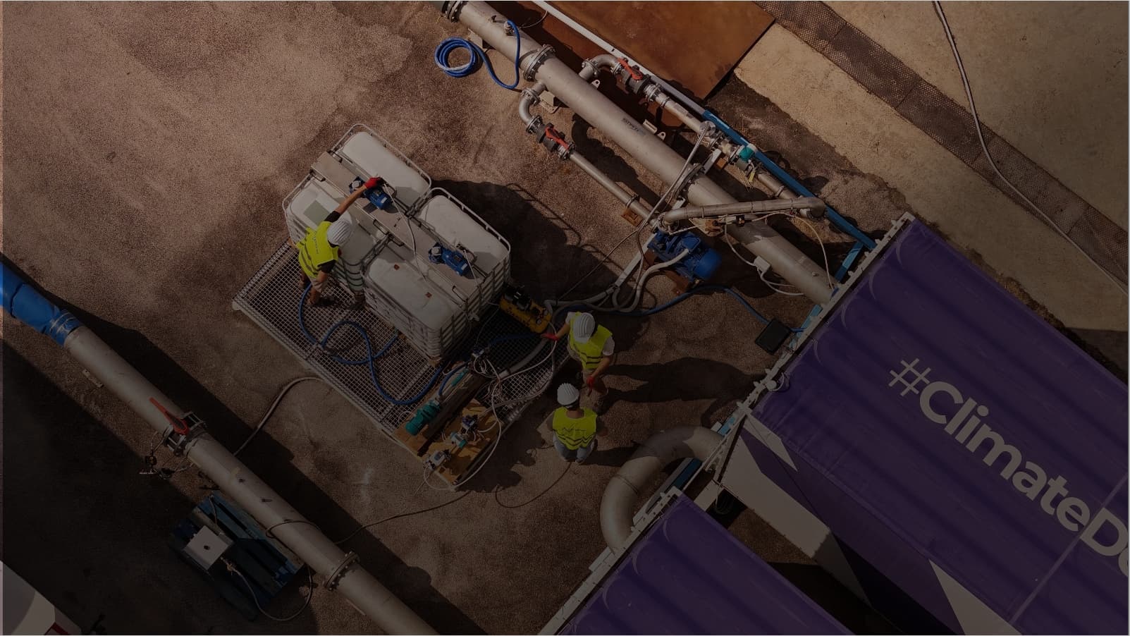 Aerial view of Limenet's ocean alkalinity enhancement equipment with workers in high-visibility clothing